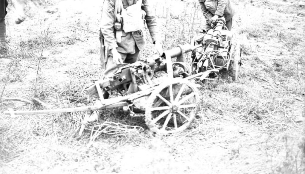 142_Canadians examining two German machine guns mounted on small trucks. Advance East of Arras. September, 1918.